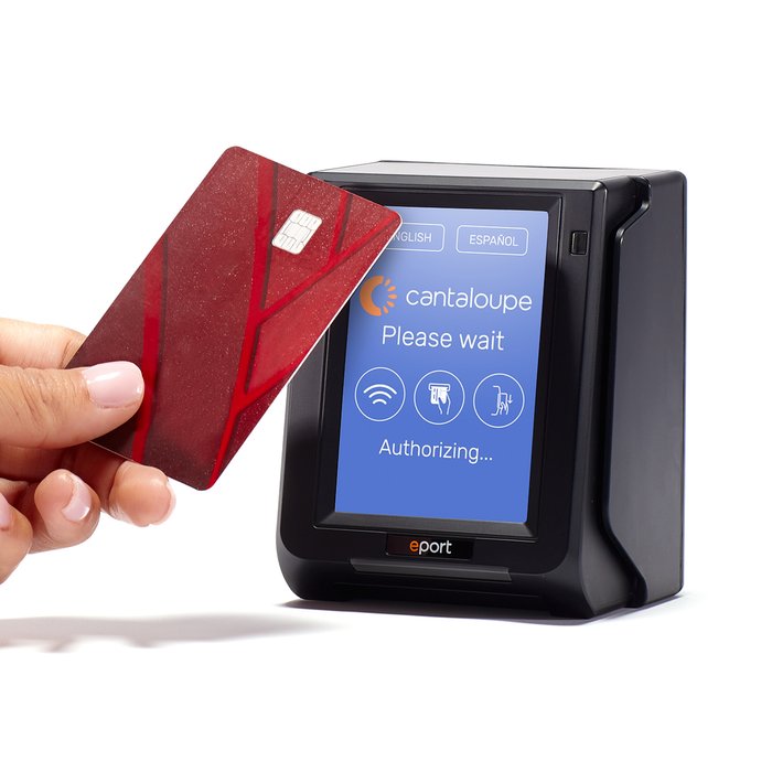 Woman make a credit card payment on an Engage card reader